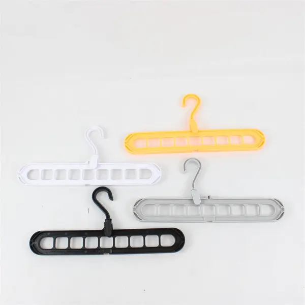 Lot of 4 Space Saving Plastic Clothes Hangers 