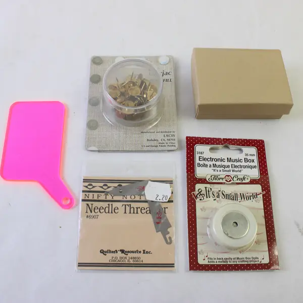 Assorted Craft Lot Sewing Tools Music Box Needle Threaders Thumb Tack Removers
