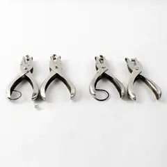 Lot of 4 McGill single hole punchers, stainless steel 