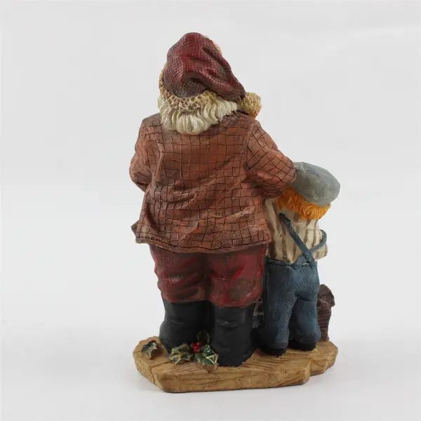 Vintage Heritage Hand-Painted Resin Santa Claus & Child Centerpiece