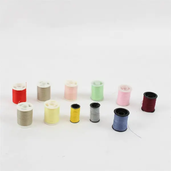 Lot of 11 Sewing Thread Spools Assorted Colors