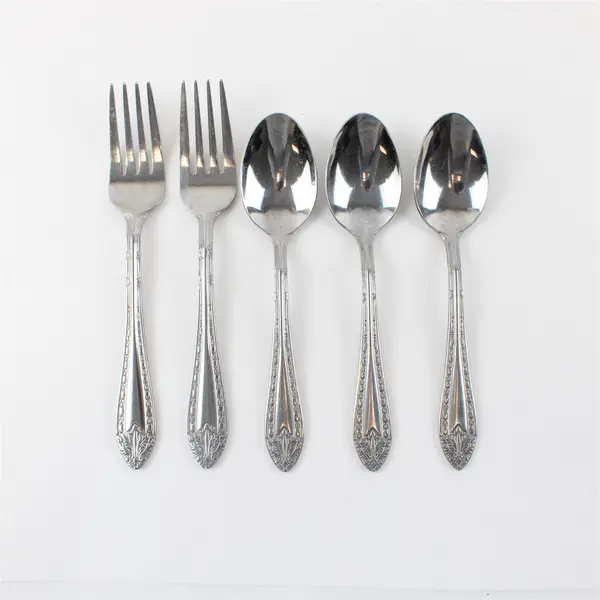  Five Stainless Reed and Barton Flatware Pieces in Marie Antoinette Pattern
