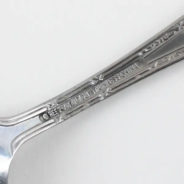  Five Stainless Reed and Barton Flatware Pieces in Marie Antoinette Pattern