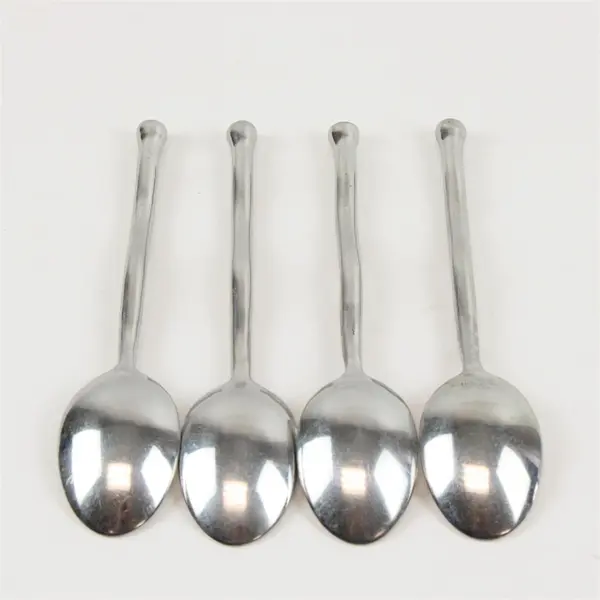 Four Gibson Polished Contour Oval/Place Spoons