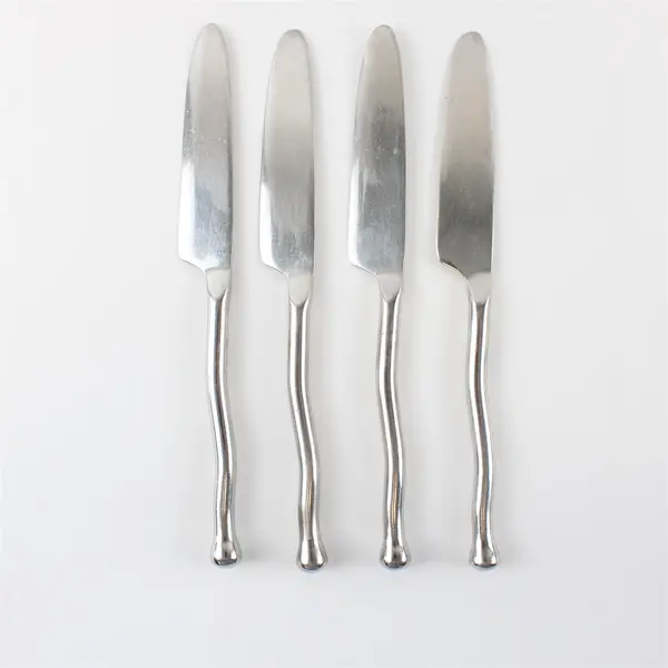 Lot of 4 Gibson Polished Contour Dinner Knives
