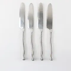 Lot of 4 Gibson Polished Contour Dinner Knives