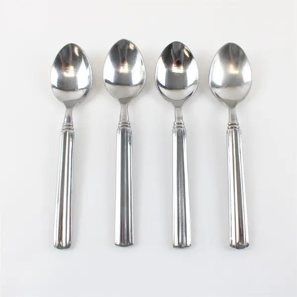Lot of Four Stainless Gibson  Place/Oval Spoons in the Pattern Sidewalk Cafe
