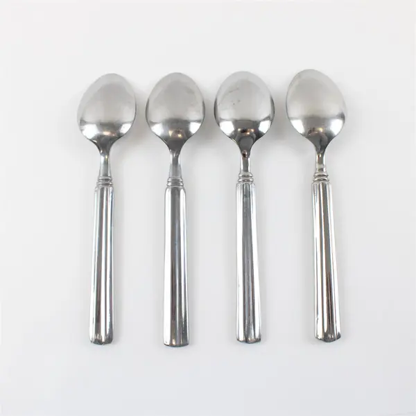 Lot of Four Stainless Gibson  Place/Oval Spoons in the Pattern Sidewalk Cafe