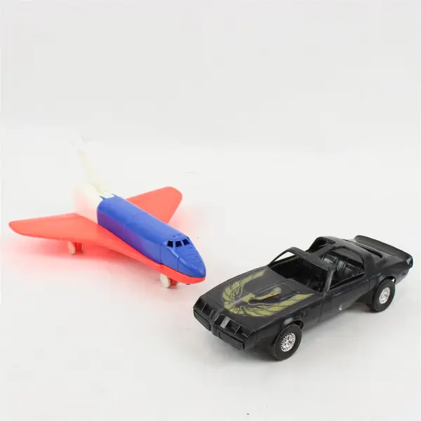 Lot of 2 Plastic Toys Firebird Trans Am & Red White Blue Airplane 