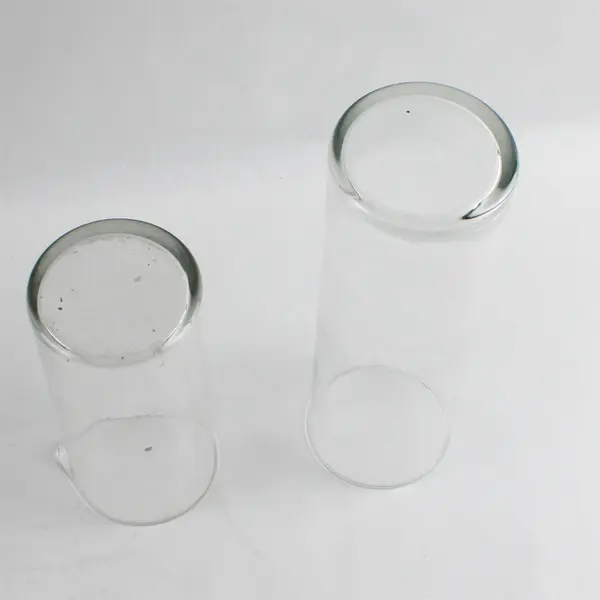 Lot of 2 Unbranded Clear Glass Vases 10.5" & 7.5" Tall