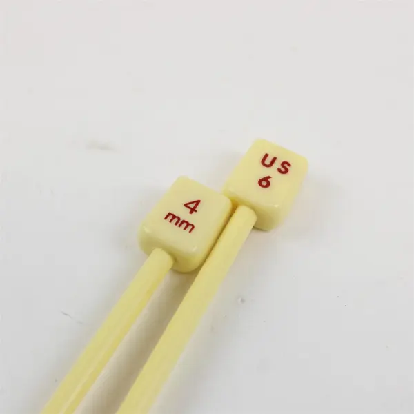 Two Pairs Unbranded Light Yellow Plastic Knitting Needles, Sizes: US 6 and US 8 