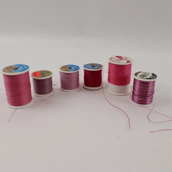 Lot of 9 Sewing Thread Spools Pink Purple Teal Gray Mixed Color Assortment
