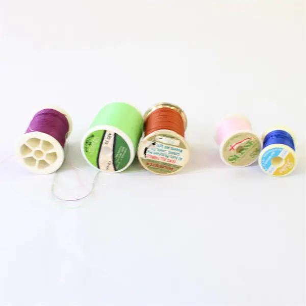 Lot of 9 Assorted Color Used Sewing Thread Spools
