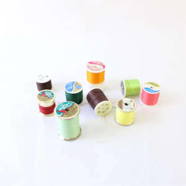 Lot of 9 Sewing Thread Spools Assorted Colors Partial Spools Pre-Owned