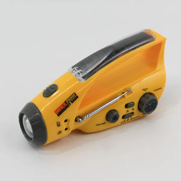 Safe-T-Proof Yellow Hand Crank Or Solar Emergency Flashlight AM-FM Radio 