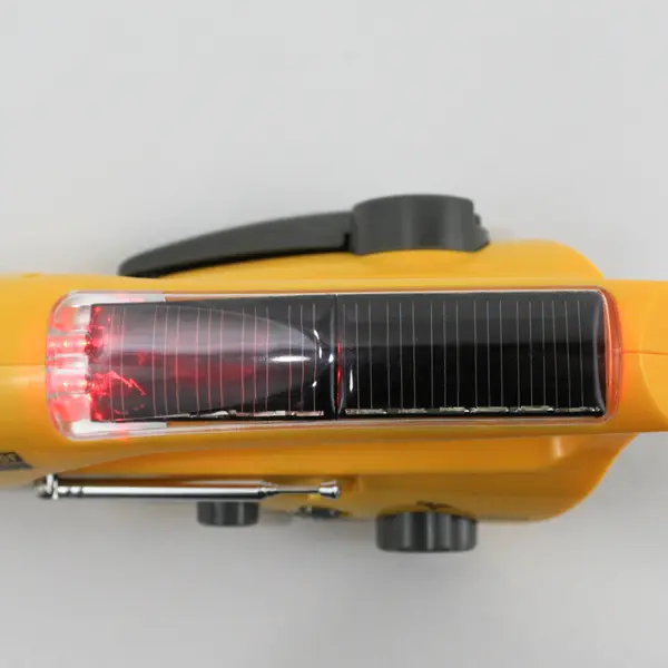Safe-T-Proof Yellow Hand Crank Or Solar Emergency Flashlight AM-FM Radio 
