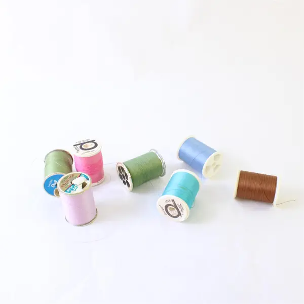 Lot of 7 Mixed Brand Sewing Thread Spools Assorted Colors Pre-Owned