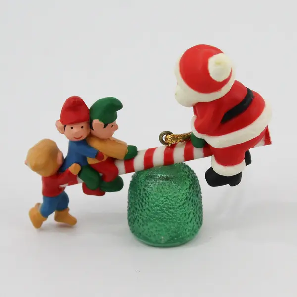 Vintage Avon Santa's See-Saw Christmas Ornament Santa with Elves