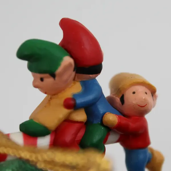 Vintage Avon Santa's See-Saw Christmas Ornament Santa with Elves