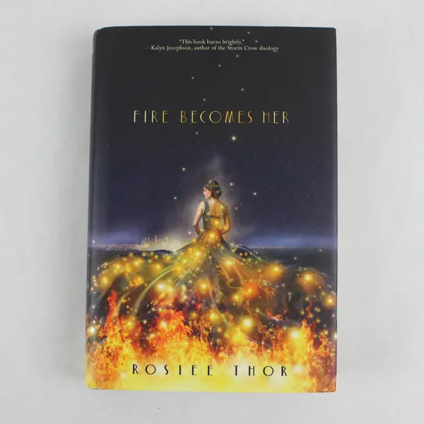 Fire Becomes Her a Novel by Rosiee Thor 1st Edition 2022 Hardcover DJ Very Good
