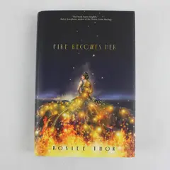 Fire Becomes Her a Novel by Rosiee Thor 1st Edition 2022 Hardcover DJ Very Good
