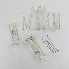 Seven Miscellaneous Plate Hangers. Brands: Bard's, Paul Briant & Sons, Unbranded