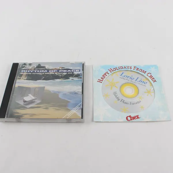 Lot of 2 CDs Dino Rhythm of Peace & Happy Holidays Lorie Line