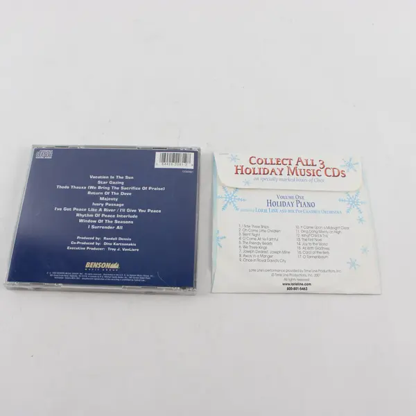 Lot of 2 CDs Dino Rhythm of Peace & Happy Holidays Lorie Line