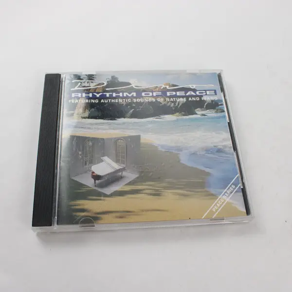 Lot of 2 CDs Dino Rhythm of Peace & Happy Holidays Lorie Line