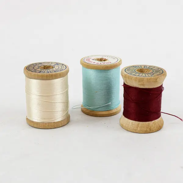Lot of 7 Sewing Thread Spools Assorted Colors Blue Cream Burgundy Pink