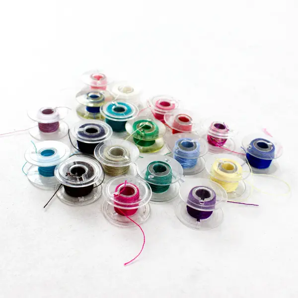 Lot of 19 Universal Plastic Sewing Machine Bobbins for Singer