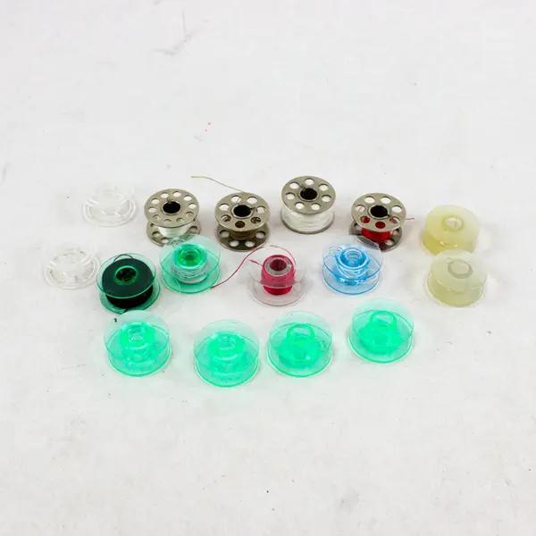 Lot of 16 Assorted Sewing Machine Bobbins Husqvarna Viking Singer Kenmore