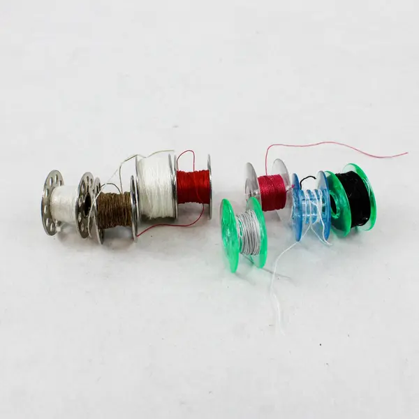 Lot of 16 Assorted Sewing Machine Bobbins Husqvarna Viking Singer Kenmore