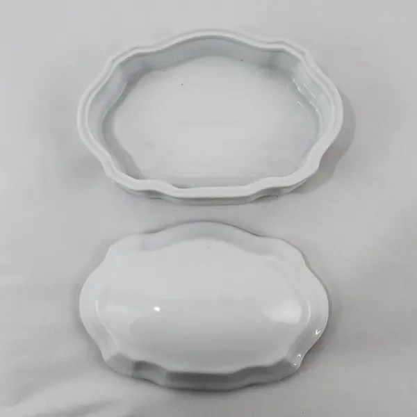 Freddi White Oval Ceramic Bowl And Lid With Scalloped Rim