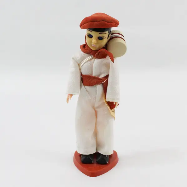 Carlson Dolls French Boy Ethnic Doll 8-75 with Red Plastic Heart Stand And Tag