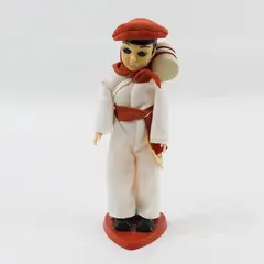 Carlson Dolls French Boy Ethnic Doll 8-75 with Red Plastic Heart Stand And Tag