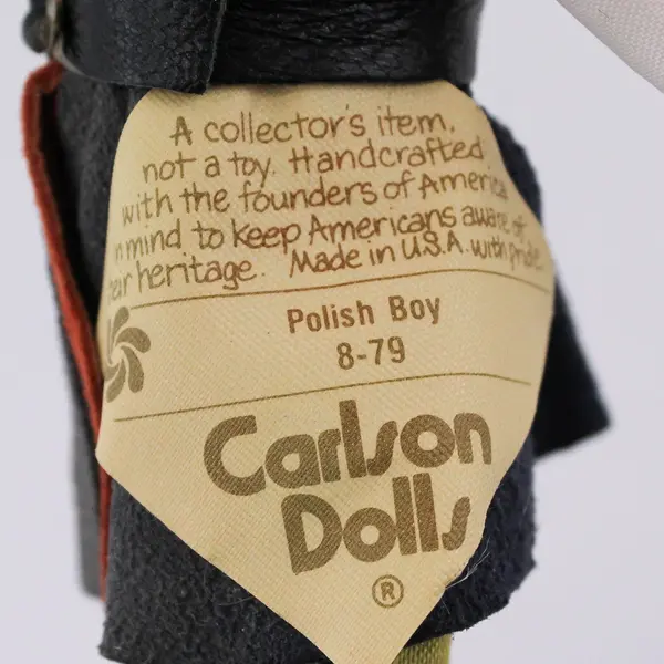 Carlson Dolls Polish Boy Ethnic Doll 8-79 with Red Plastic Heart Stand And Tag