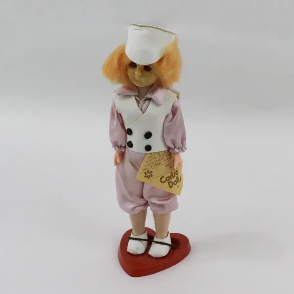 Carlson Dolls Dutch Boy Ethnic Doll 8-39 with Red Plastic Heart Stand And Tag