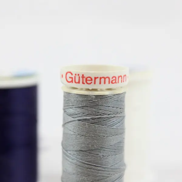 Lot of 8 Coats Gutermann Sewing Thread Spools Mixed White Gray Pink Cream Navy
