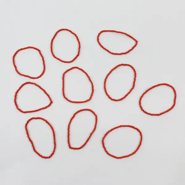 Lot of 8 Orange Stackable Seed Bead Stretch Bracelets