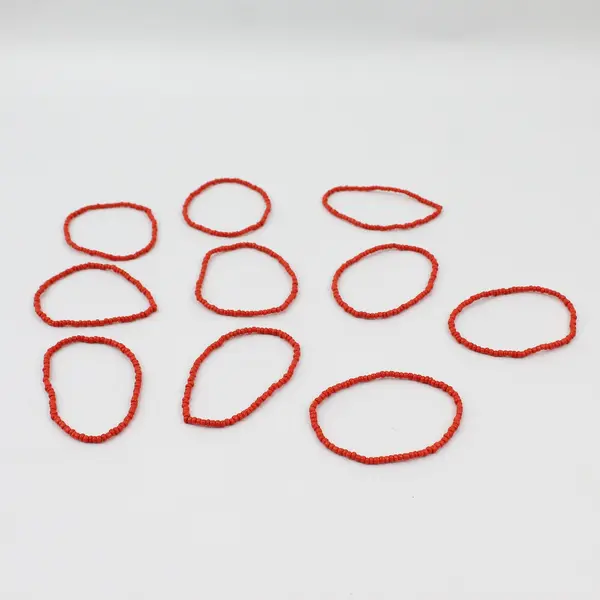 Lot of 8 Orange Stackable Seed Bead Stretch Bracelets