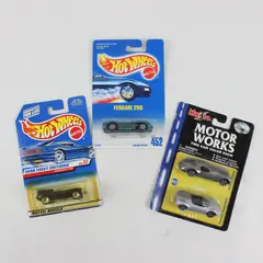 Lot of 4 Sealed Hot Wheels Maisto Jaguar Ferrari Chrysler Plymouth Diecast