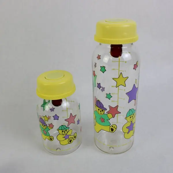 Crib Mates Baby Feeding Set 7 Piece Bottle Bib Brush Rattle Pre-Owned