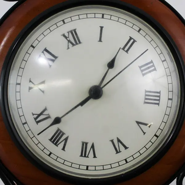 Wrought Iron And Wood Hanging Battery Operated Wall Clock