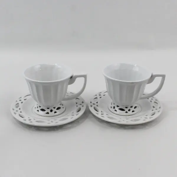 Two Bombay Ribbed Coffee Cups Pierced Feet With Matching Saucers Pierced Rims