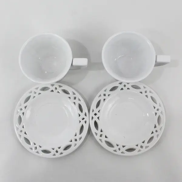 Two Bombay Ribbed Coffee Cups Pierced Feet With Matching Saucers Pierced Rims