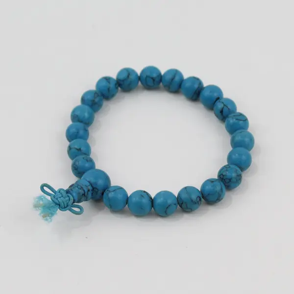 Turquoise Bead Stretch Bracelet Knotted Cord Pre-Owned