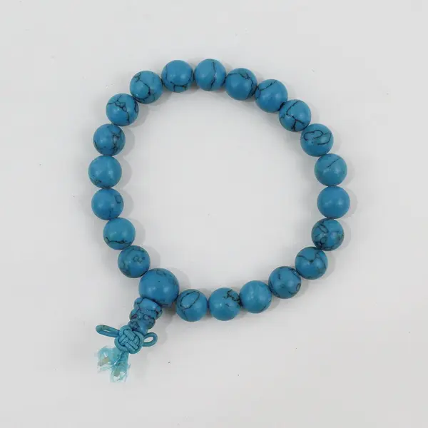 Turquoise Bead Stretch Bracelet Knotted Cord Pre-Owned