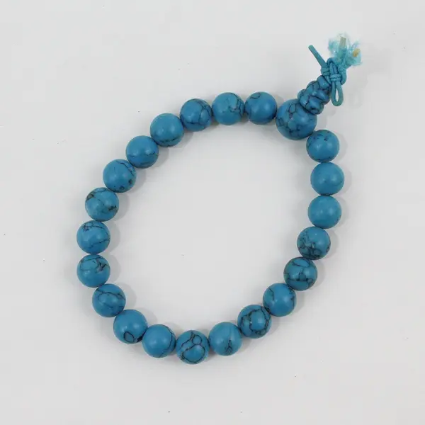 Turquoise Bead Stretch Bracelet Knotted Cord Pre-Owned