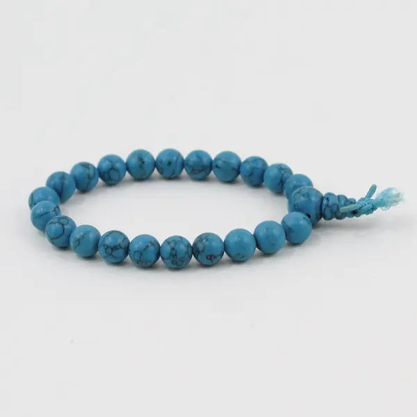 Turquoise Bead Stretch Bracelet Knotted Cord Pre-Owned